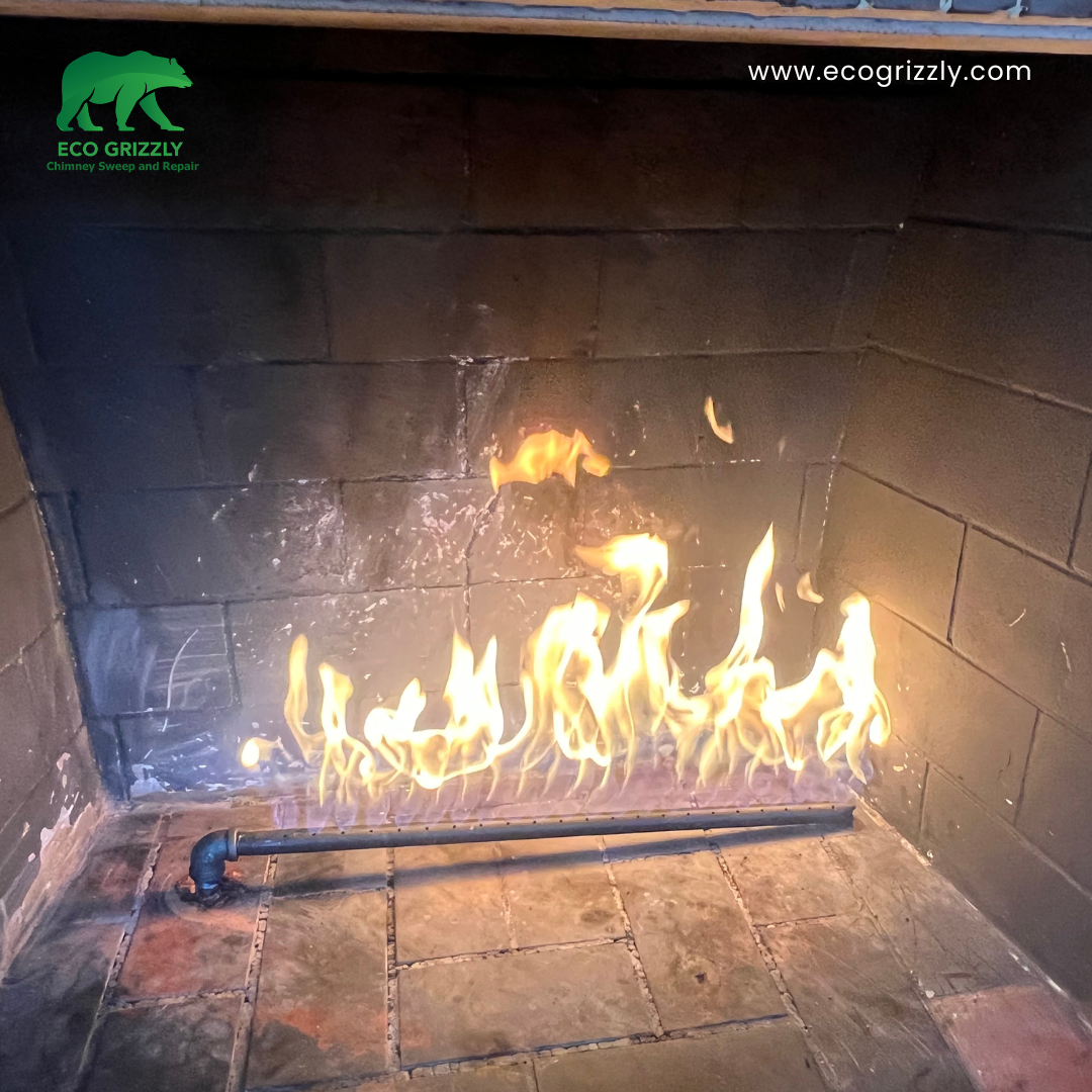 Professional chimney cleaning in progress removing soot and creosote from the flue