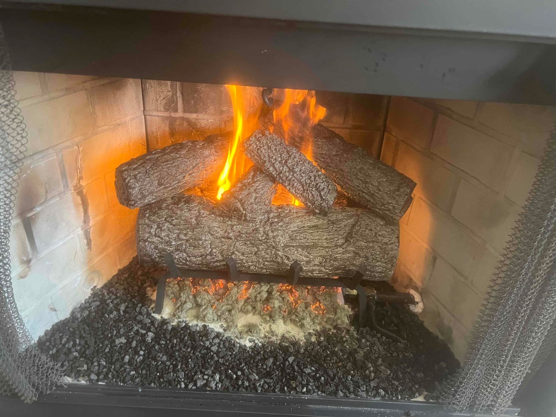 Chimney inspection showing flue interior and brick condition