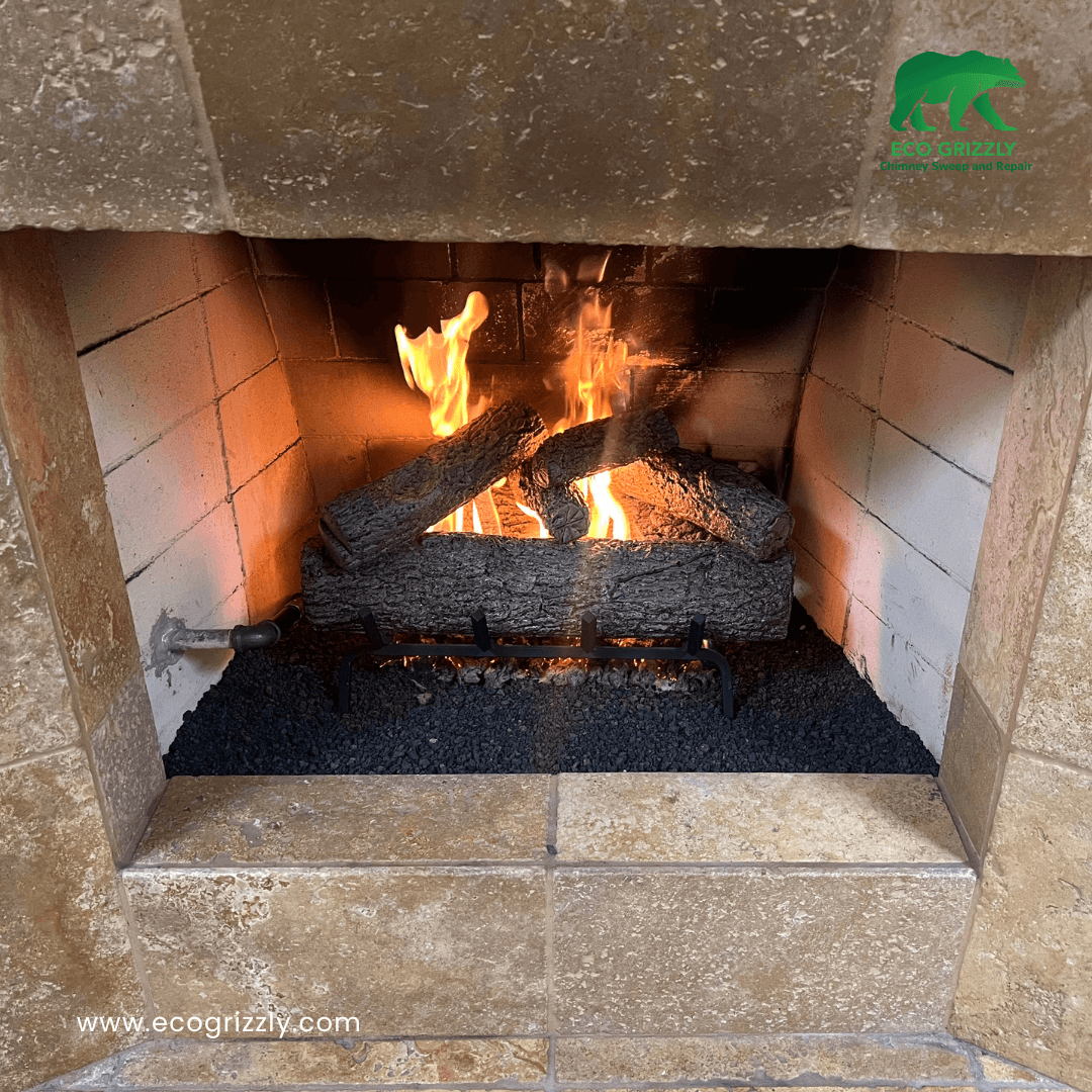 Chimney cleaning service completed with gas logs in place ready for use