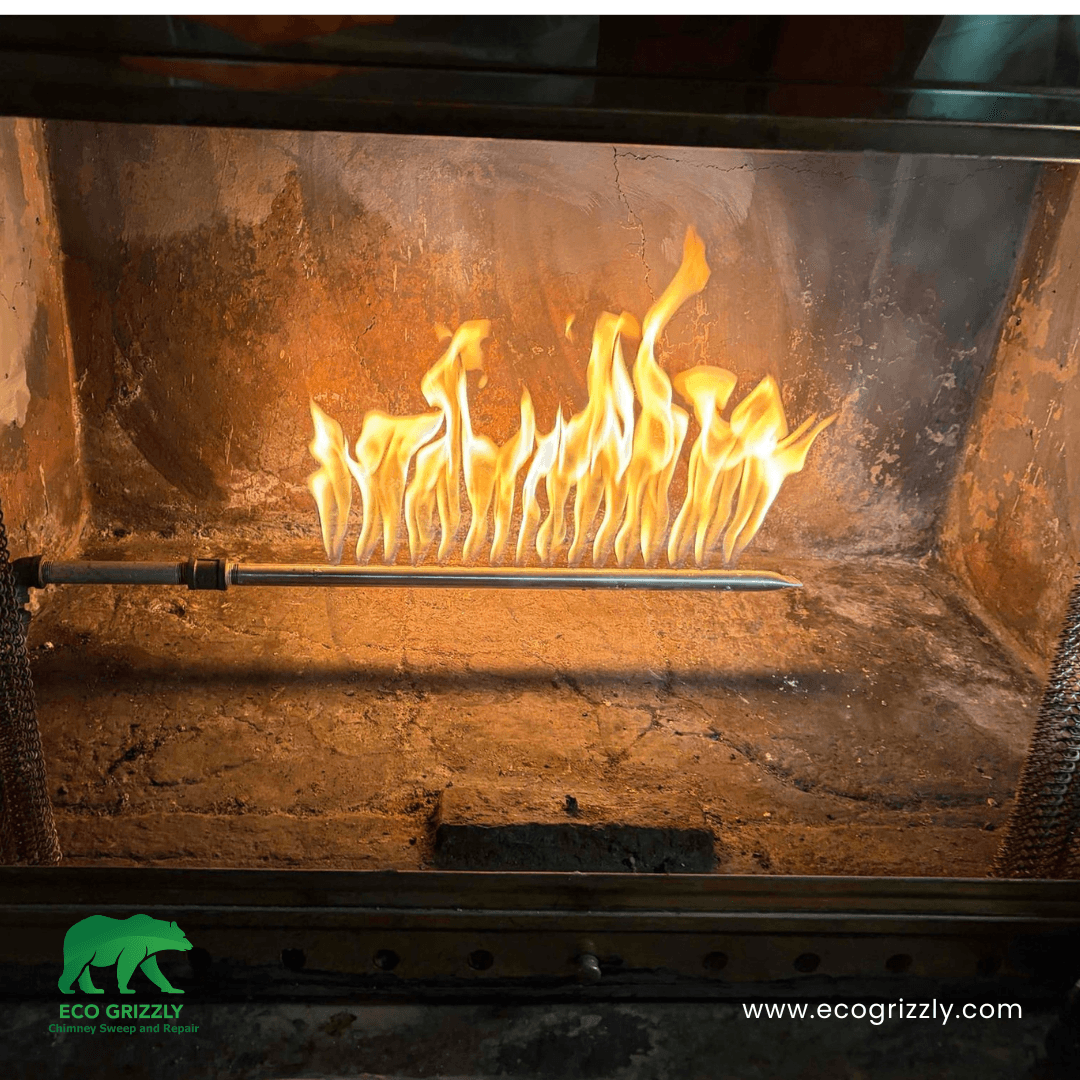 Creosote removal from chimney flue walls during a professional sweep service