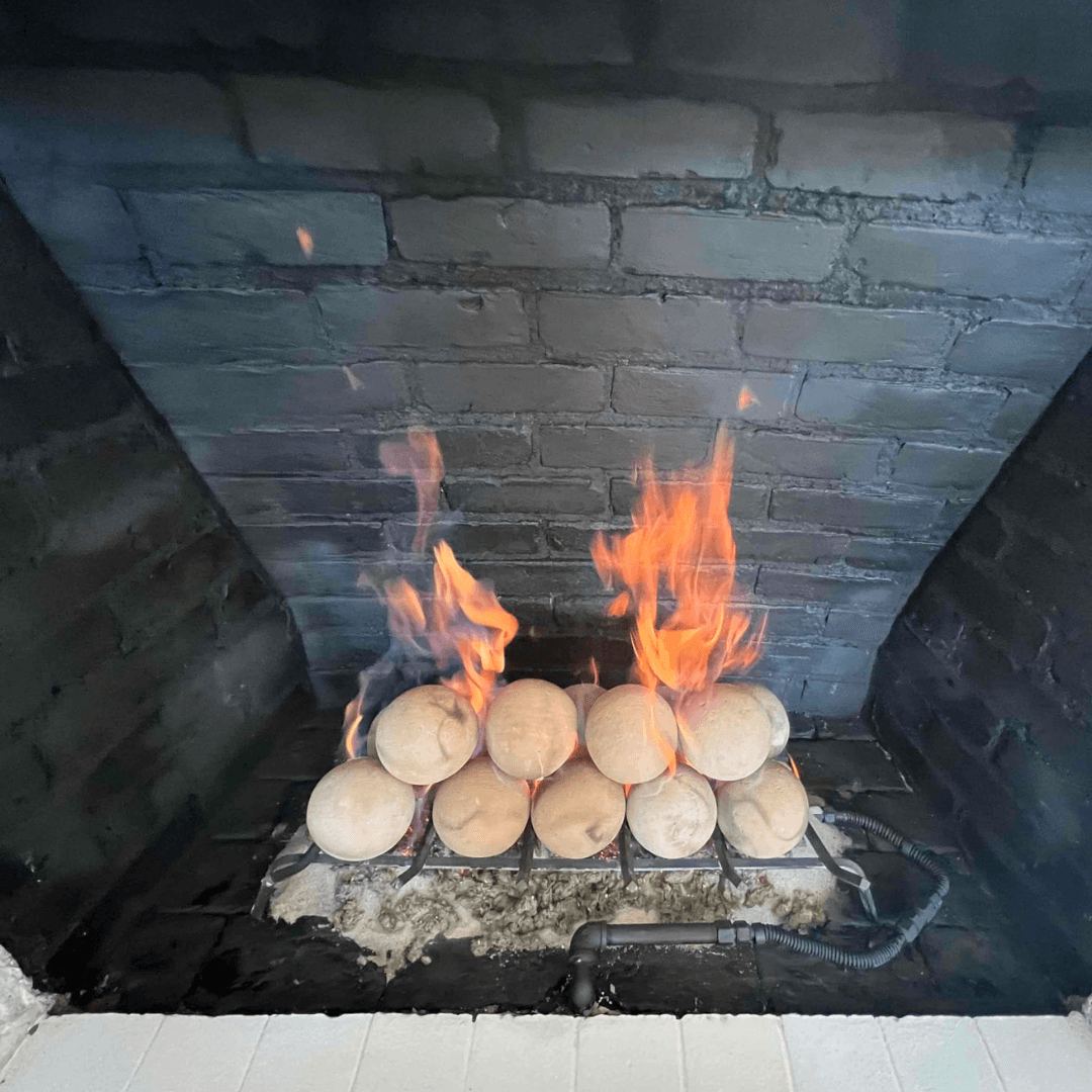 Decorative glass sphere balls filling a gas fireplace for a modern look