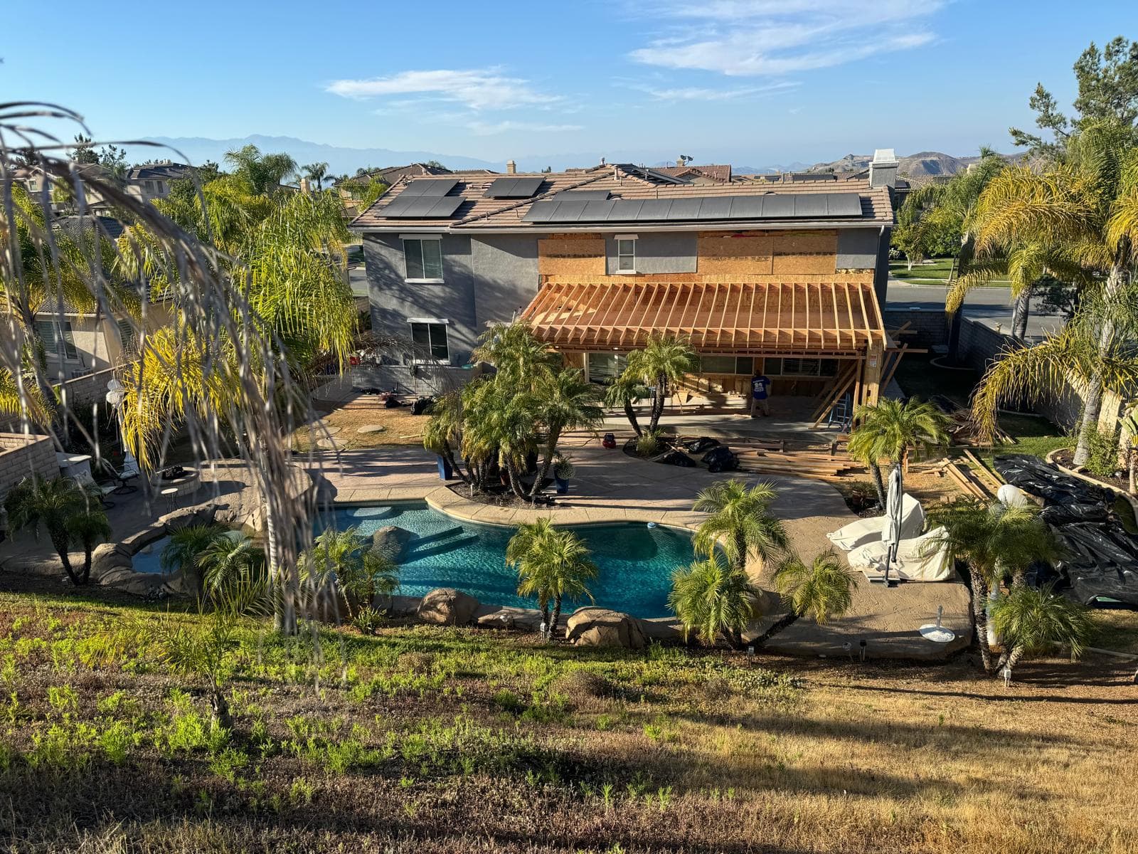 Residential addition with exterior finishing and roofing