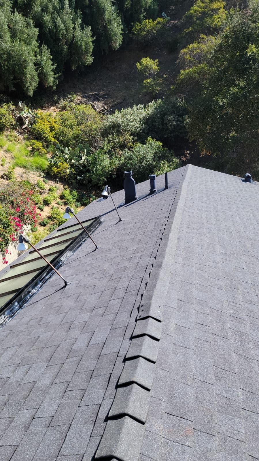 Roof installation project showing new roofing materials in place