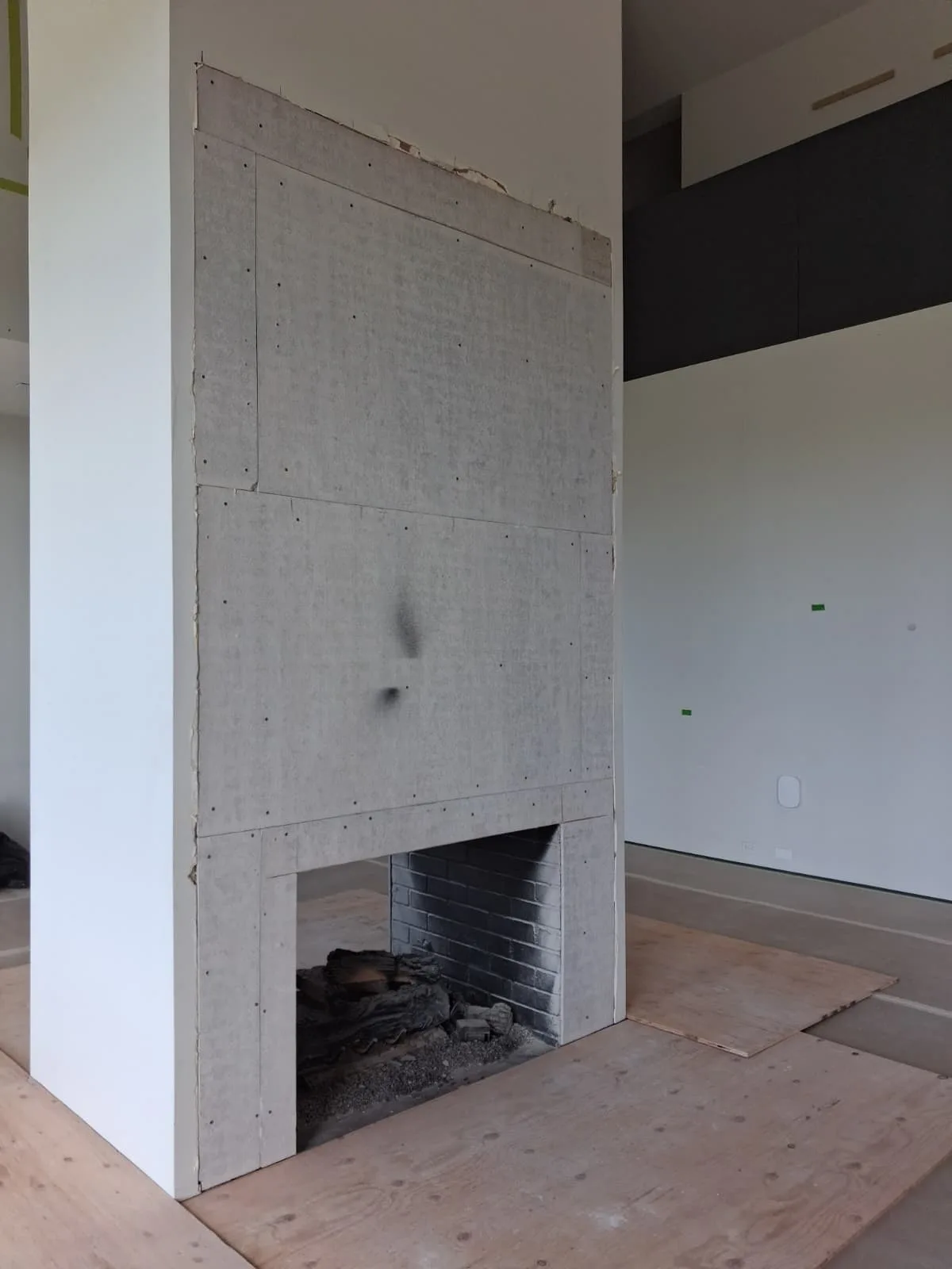 Second angle of the cement board wrapped fireplace column ready for the Venetian plaster finish