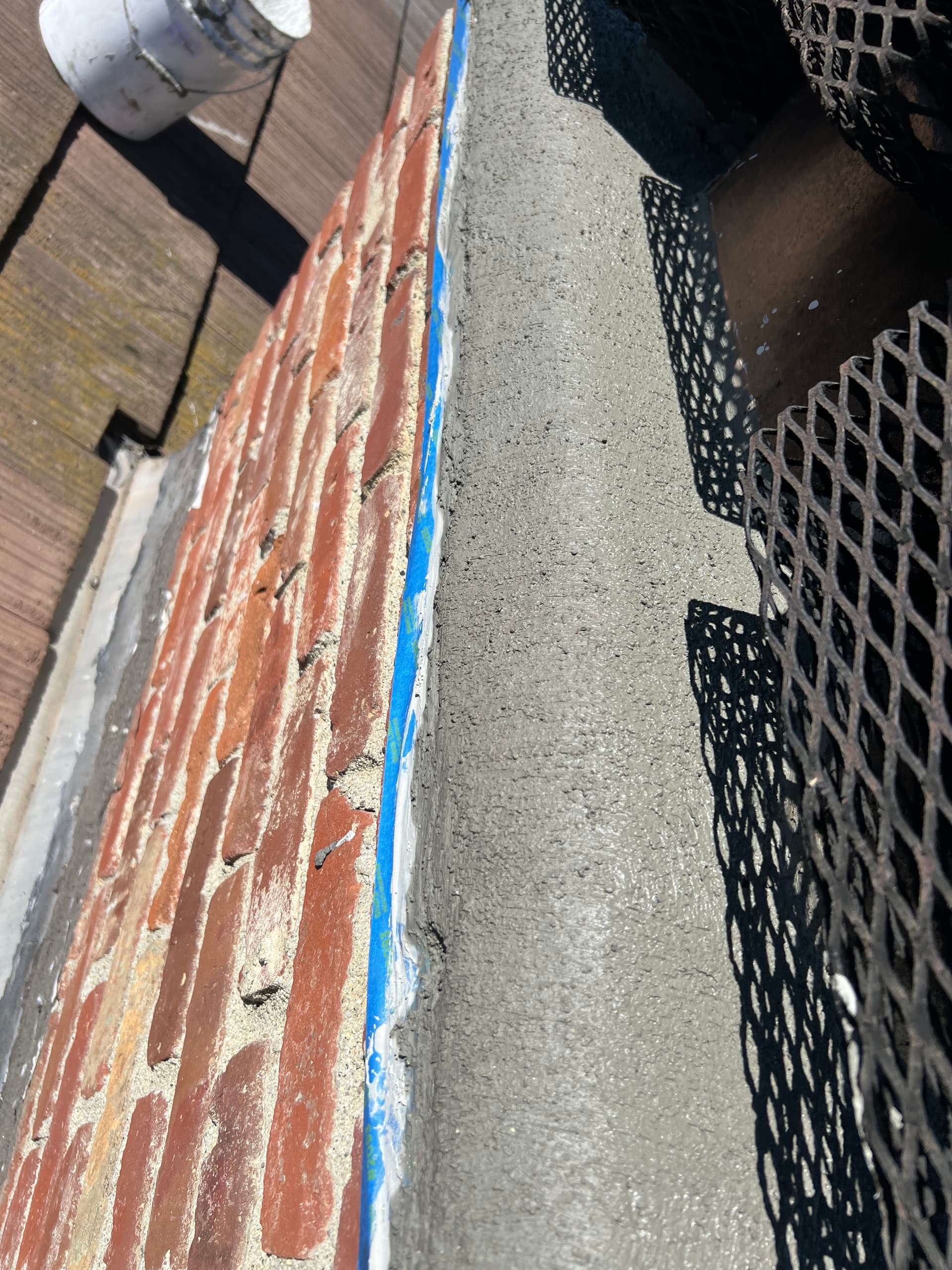 Chimney crown after elastomeric repair coat applied