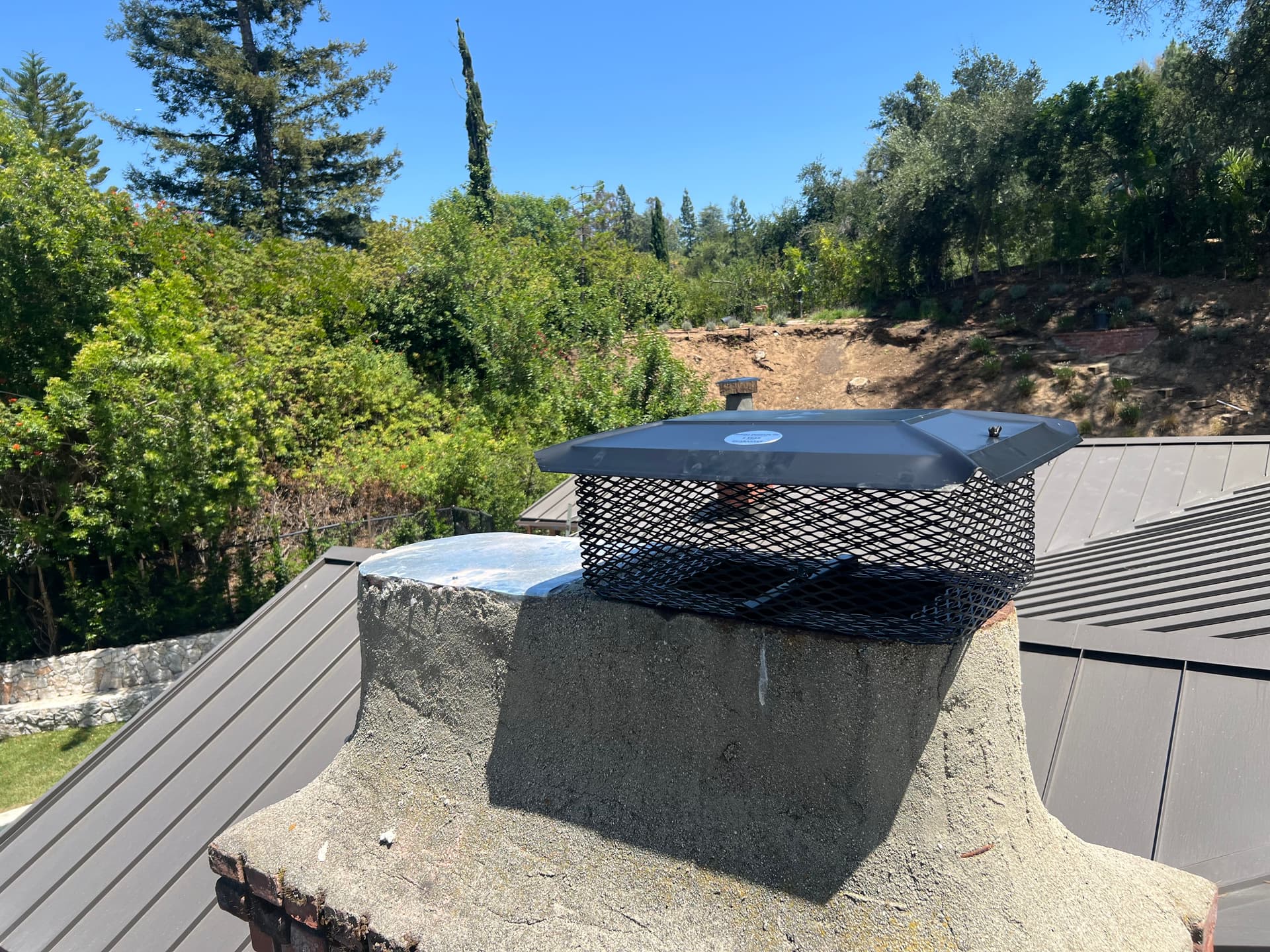 Severely deteriorated chimney crown before full rebuild