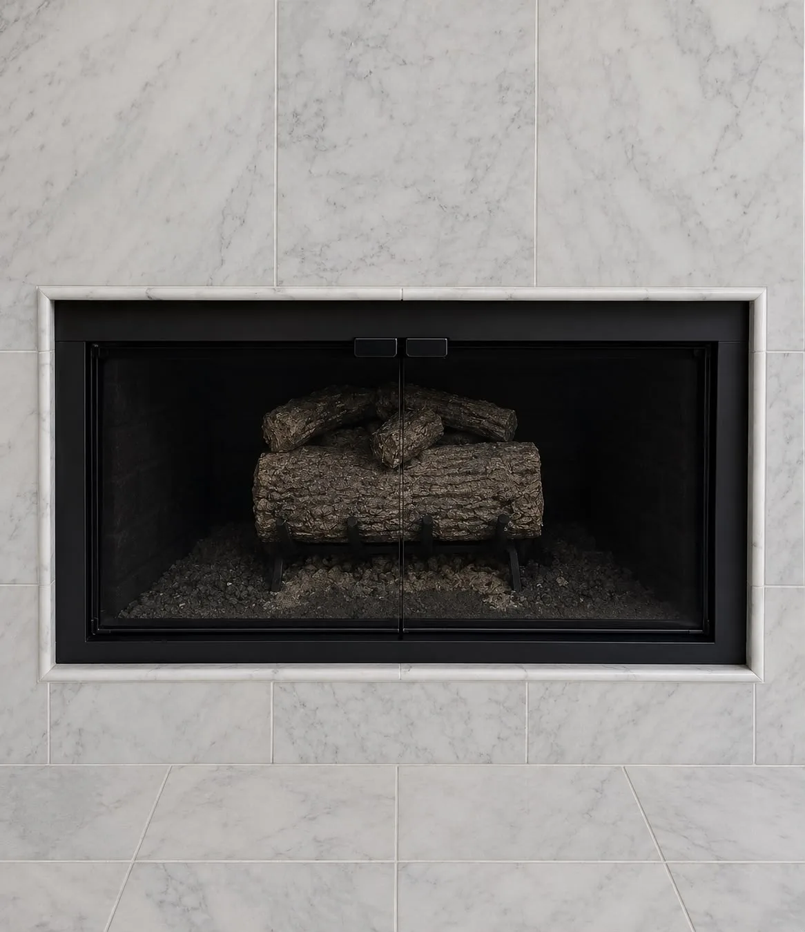 Completed fireplace glass door installation with matte black bi-fold frame