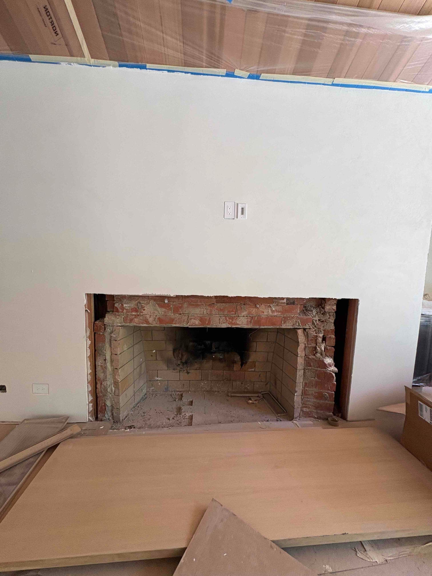 Empty wood-burning firebox before gas log set installation
