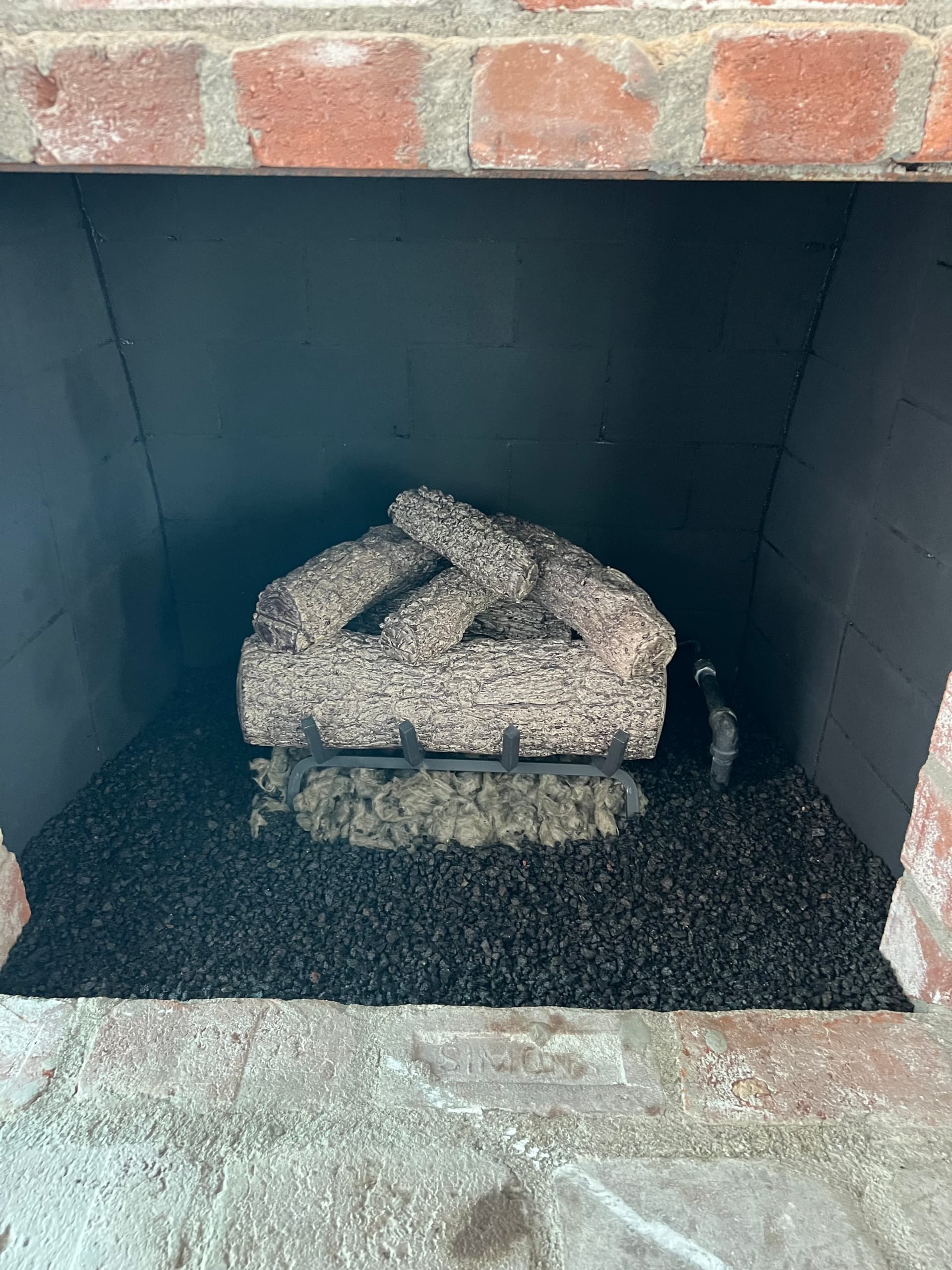 New premium gas log set installed with bright ember glow