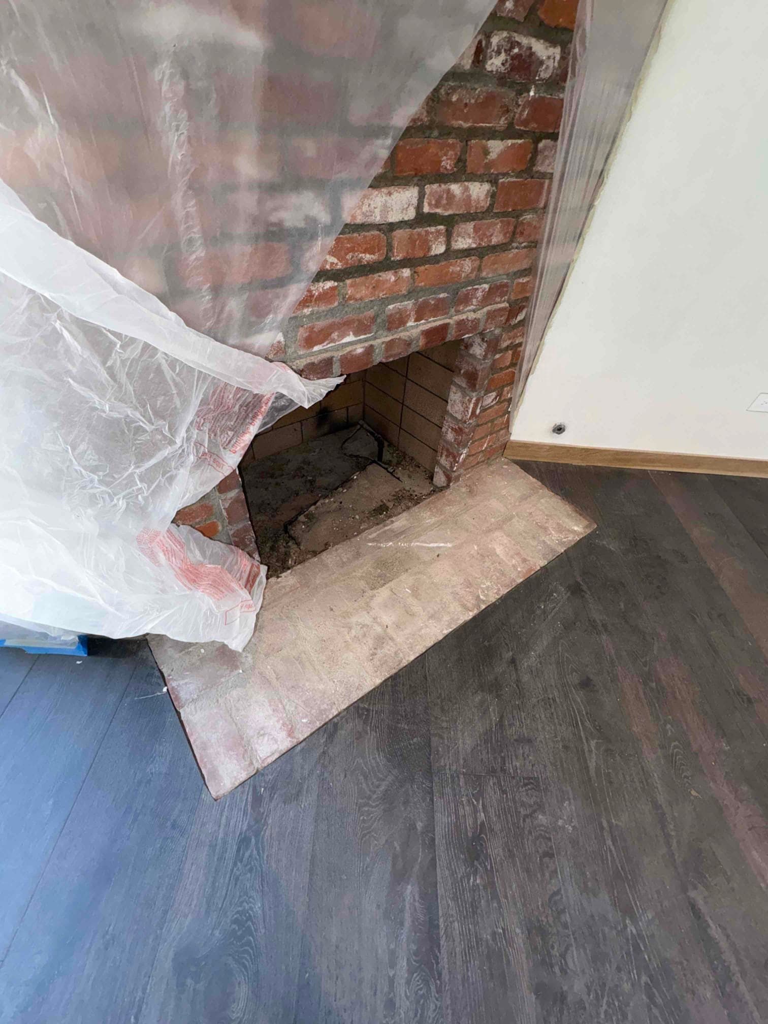 Old discolored gas log set before replacement