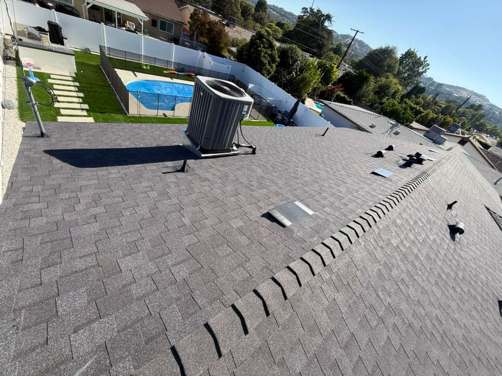 Completed roof replacement with new architectural shingles, view 3