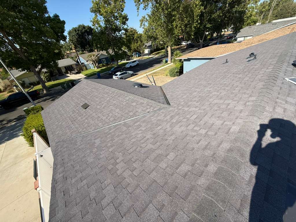 Completed roof replacement with new architectural shingles, view 5