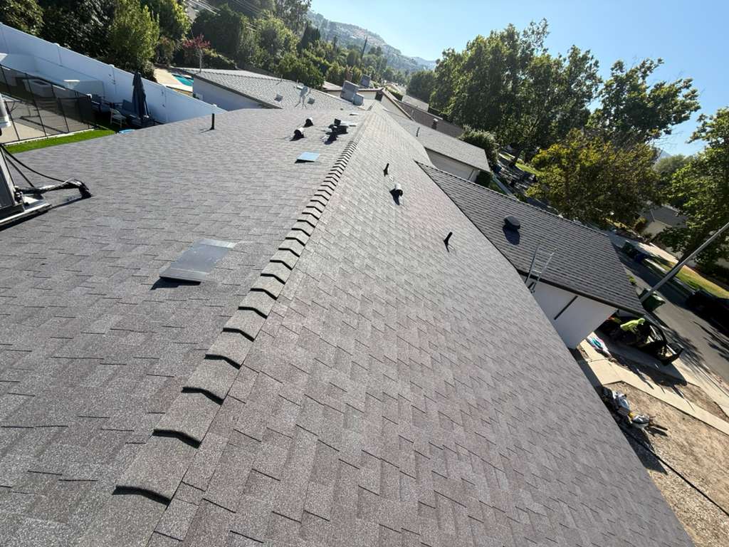 Completed roof replacement with new architectural shingles installed
