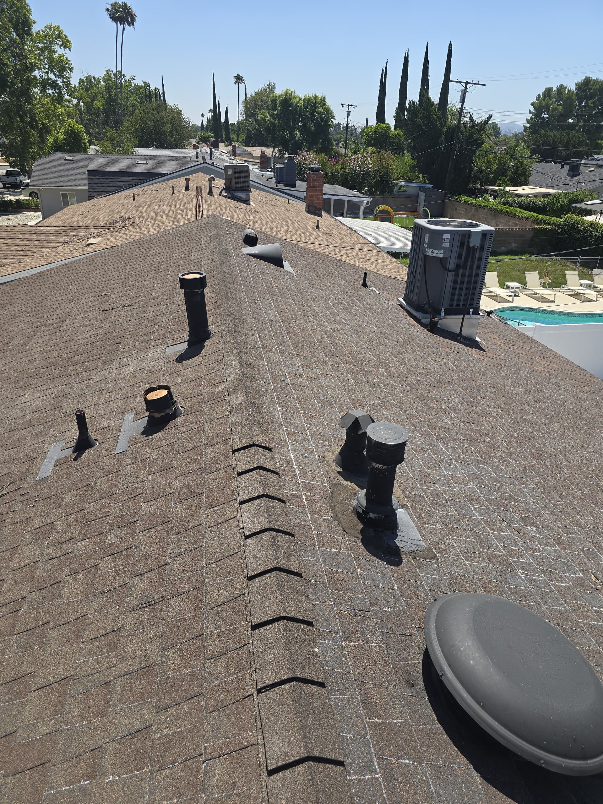 Wide view of the roof before replacement showing full extent of wear