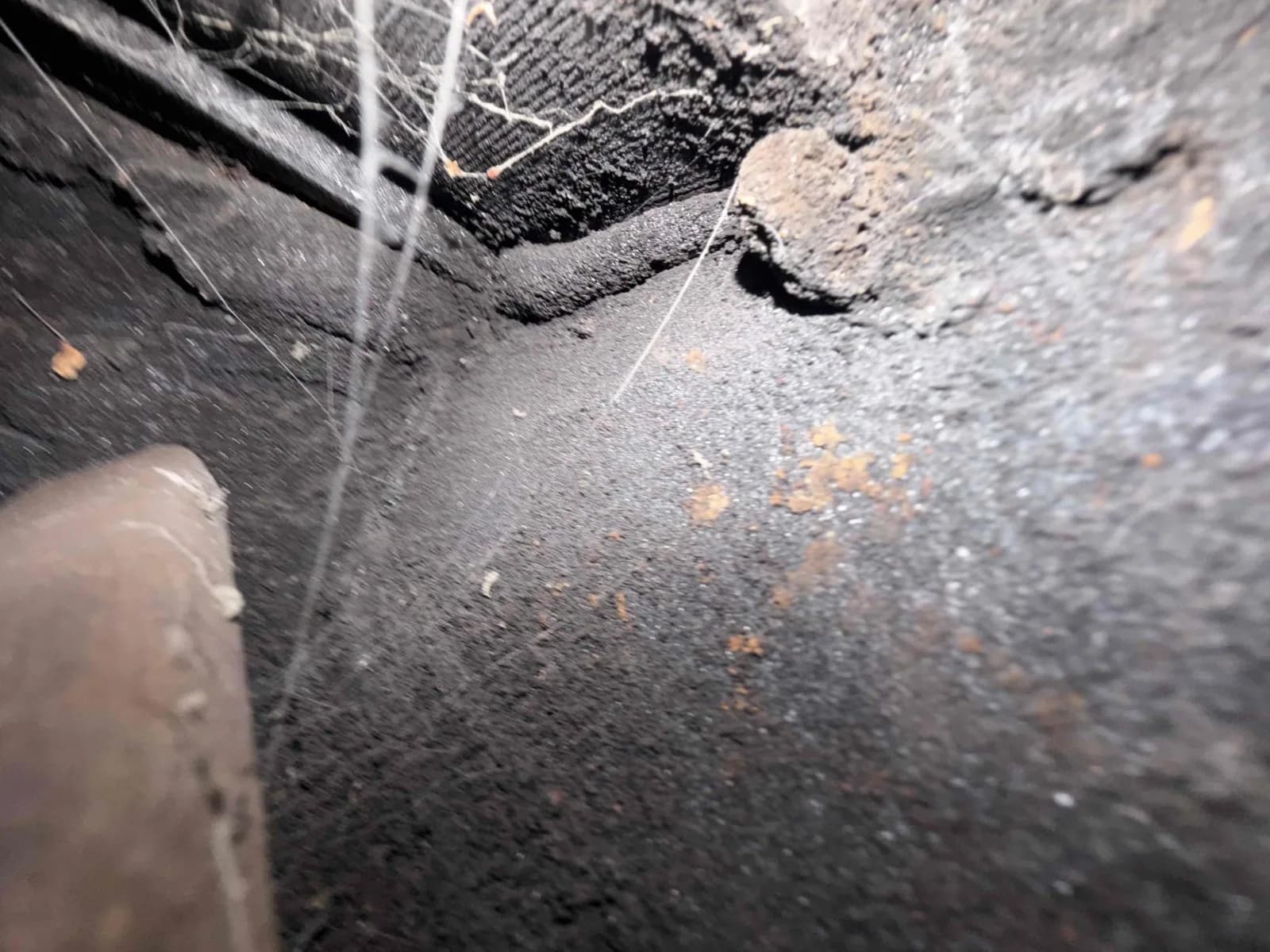 Second view of creosote deposits on firebox walls before PCR application