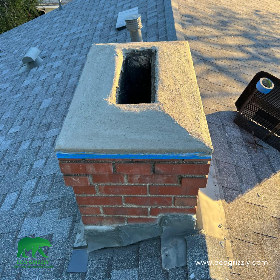 Chimney cement crown resurfaced with new protective coating to stop water intrusion