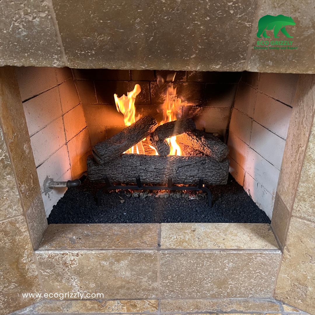 Chimney cleaning service completed with gas logs in place ready for use