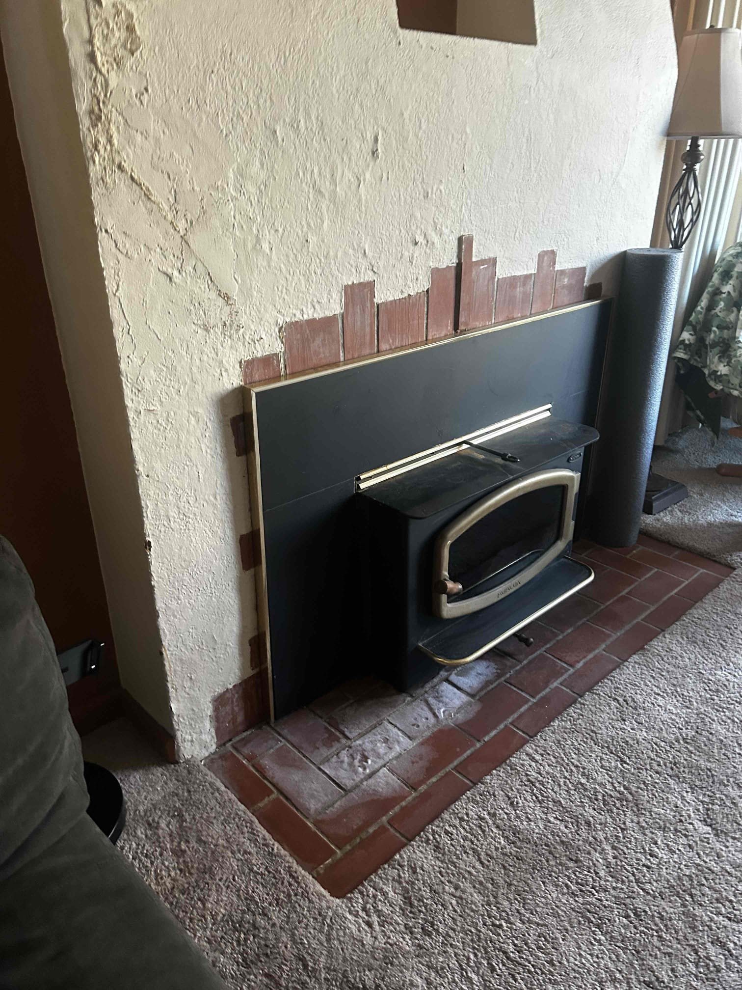 Water-damaged ceiling showing stains and mold growth before repair